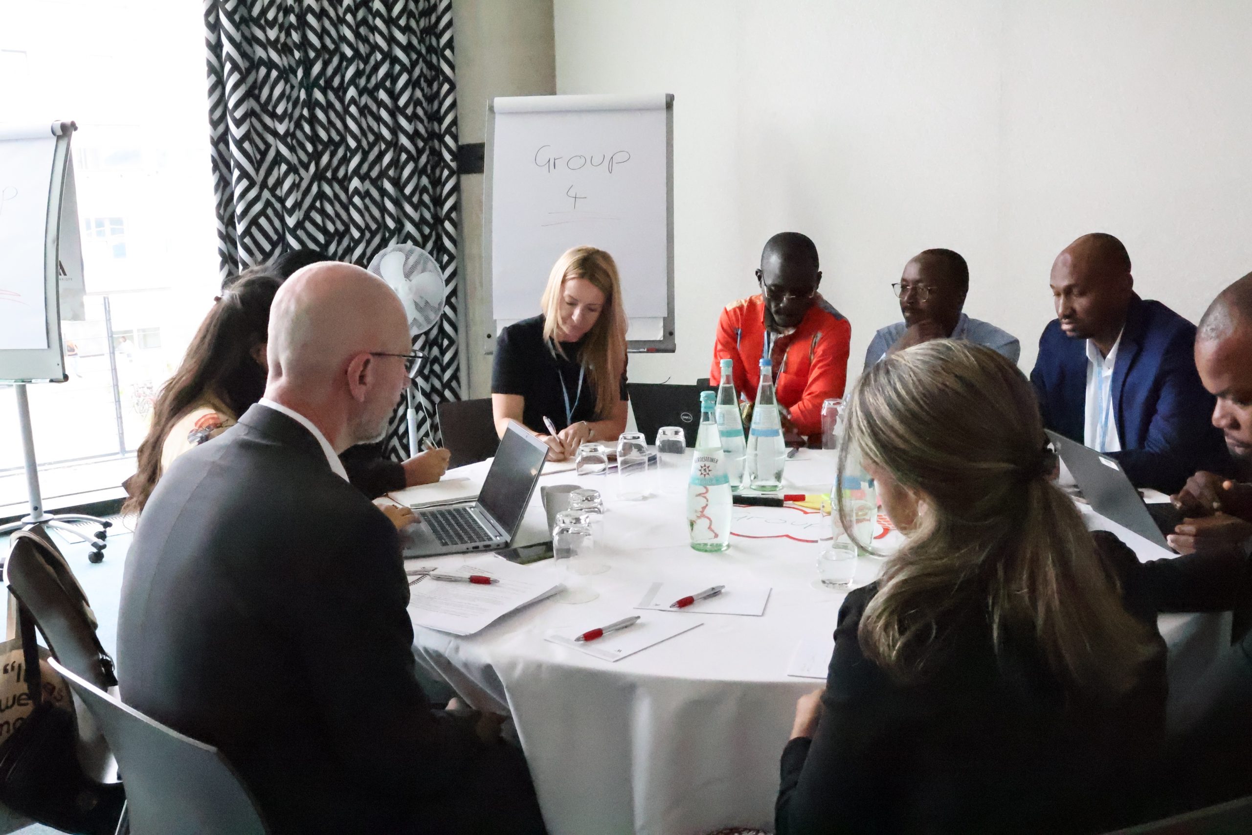 Workshop participants engage in discussions. 
